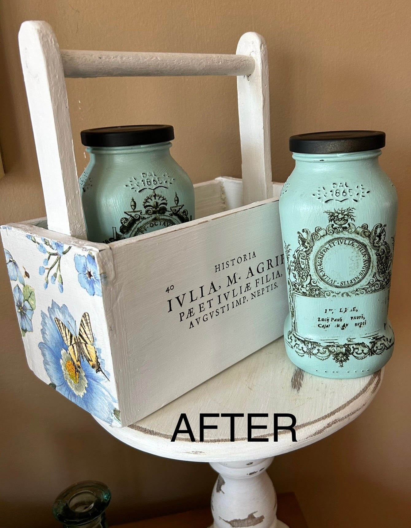 Decoupaged wooden tote with painted jars  decorated with iod transfers.