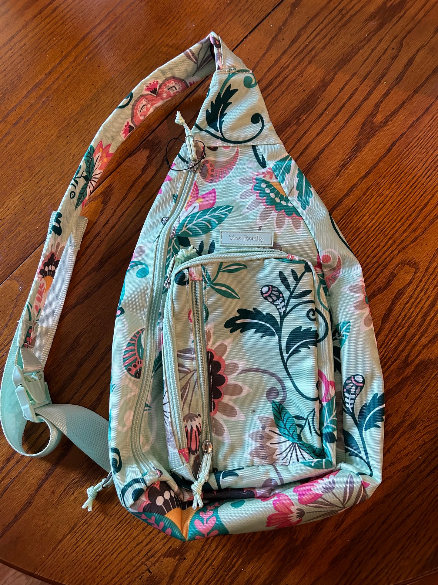 Vera Bradley Reactive Mint Green Floral Sling backpack